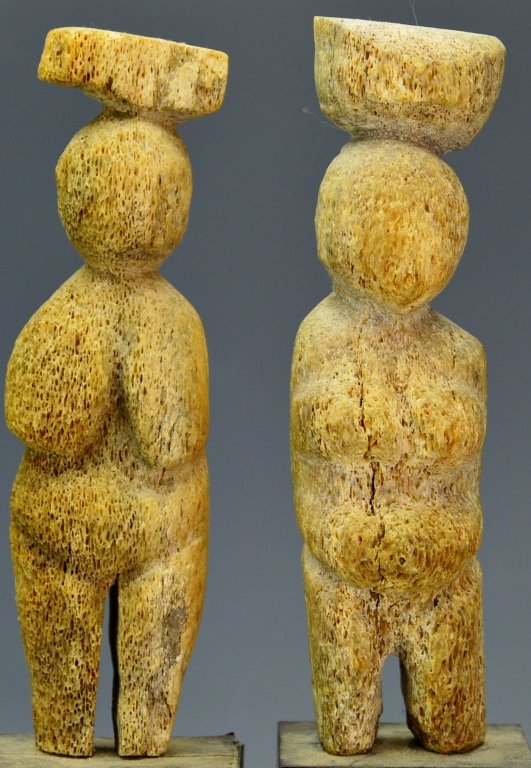 Carved Whale Bone Figures: Sotheby's: Carved Sperm whale bone figures, one male and one female. Measure approx. 5" not including base. Purchased at Sotheby Parke Bernet sale # 374, 9/24/74. Lot # 207. From the collection of Professor Robe
