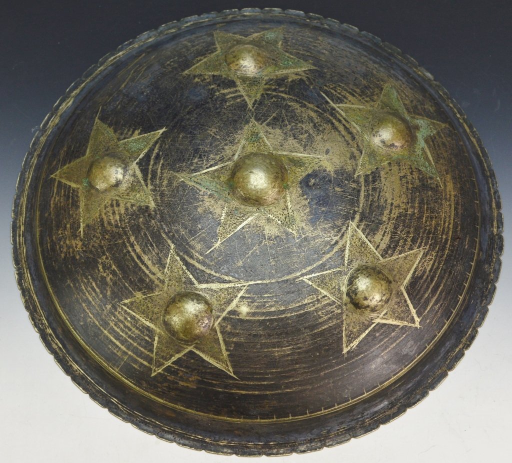 Aceh Brass Buckler: Minangkabau People for the Aceh Market, Sumatra, Indonesia 19th century diameter: 10.5" Shields or bucklers such as this example were cast by the matrilineal Minangkabau people of west Sumatra for exp