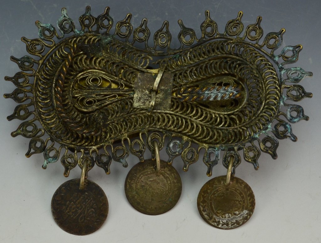 Islamic Decorative Buckle: Islamic Decorative Buckle with decorative floral design and three islamic coins. Measures 4.5"
