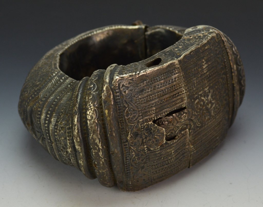 Islamic Cuff Bracelet: Hammered decoration. Has loss to hinge and missing pin, measures: 4" x 4.5" x 2"