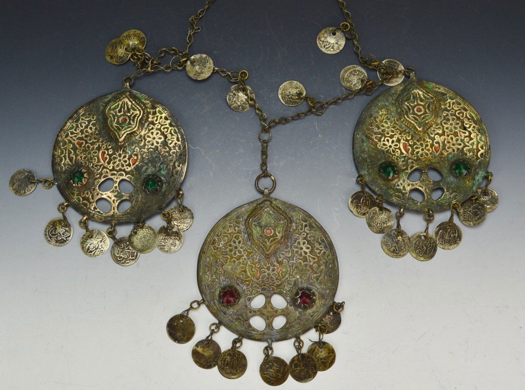 Islamic Necklace: Islamic Necklace Possibly Persian or Ottoman, late 19th century, includes 30 Islamic coins and intricately designed disks with green and red paste stones, Chain: 25"