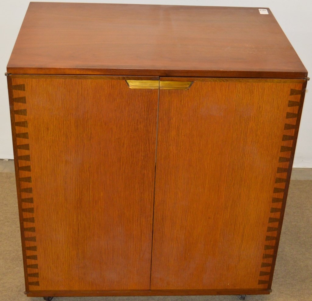 Mid Century Modern Cabinet: Modern cabinet previously housed a television, can be used as a bar, measures 31" by 33" by 20.5".