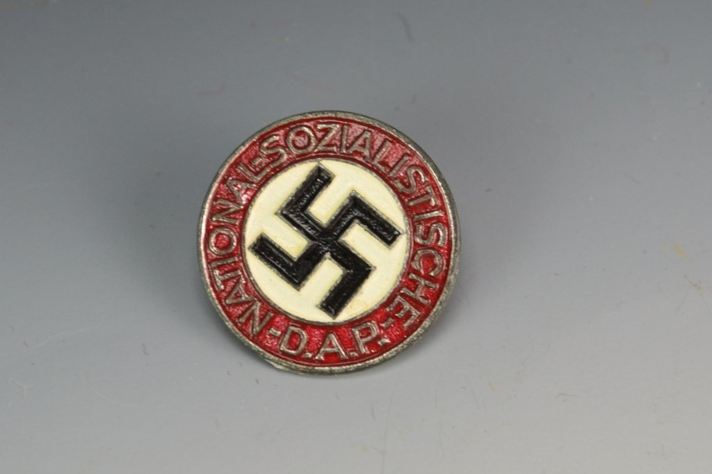 German WWII NSDAP Pin M1/77: German WWII NSDAP member's lapel pin. Reverse marked "RZM" and "M1/77" Maker: Foerster & Barth-Pforzheim