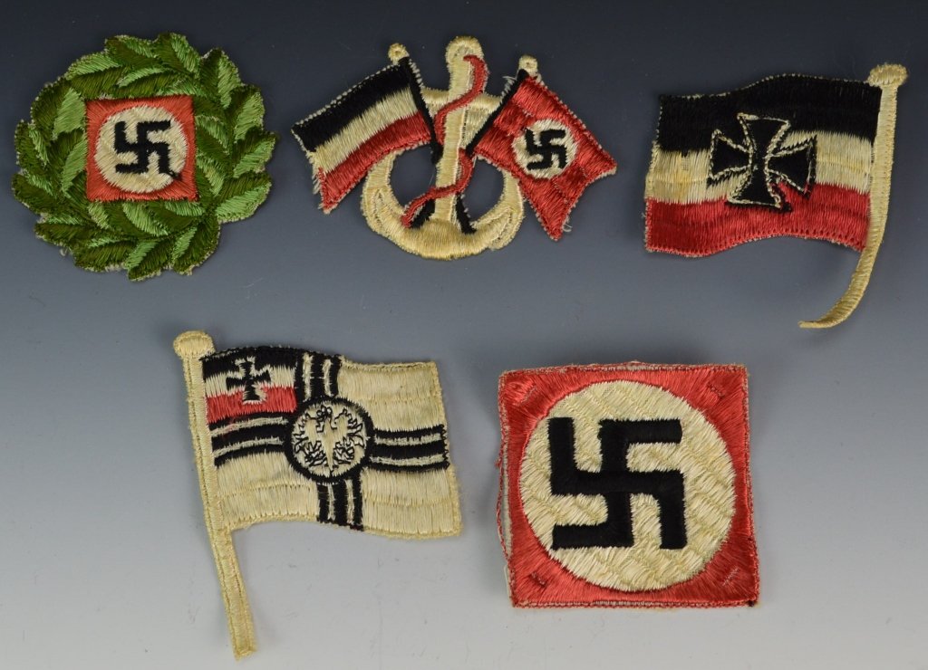 German WWI and WWII Patch Grouping: Includes naval patch with anchor and two flags, swastika on green wreath, square swastika patch, imperial Prussian war flag, and Prussian flag patch.