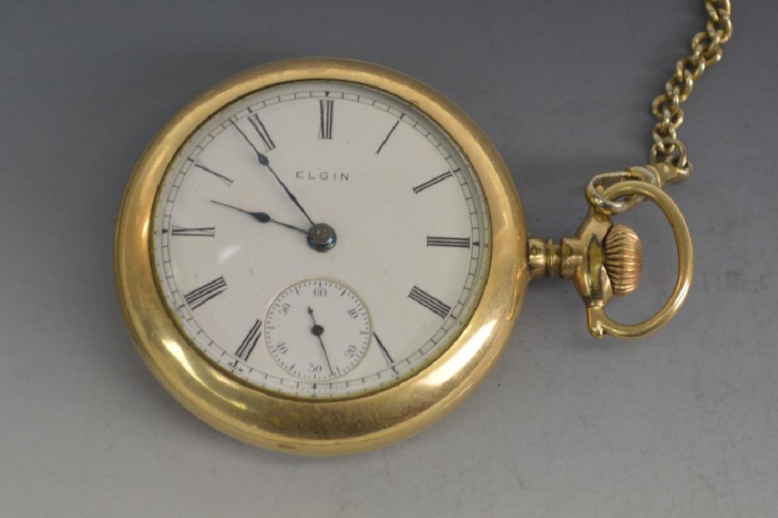 Large Antique Elgin Sidewinder Pocket Watch: Includes large antique Elgin sidewinder pocket watch, has a gold filled case, on the back of works the watch is marked Elgin National Watch Co. USA. 15J Serial # 8862448, inside of the rear of the cas