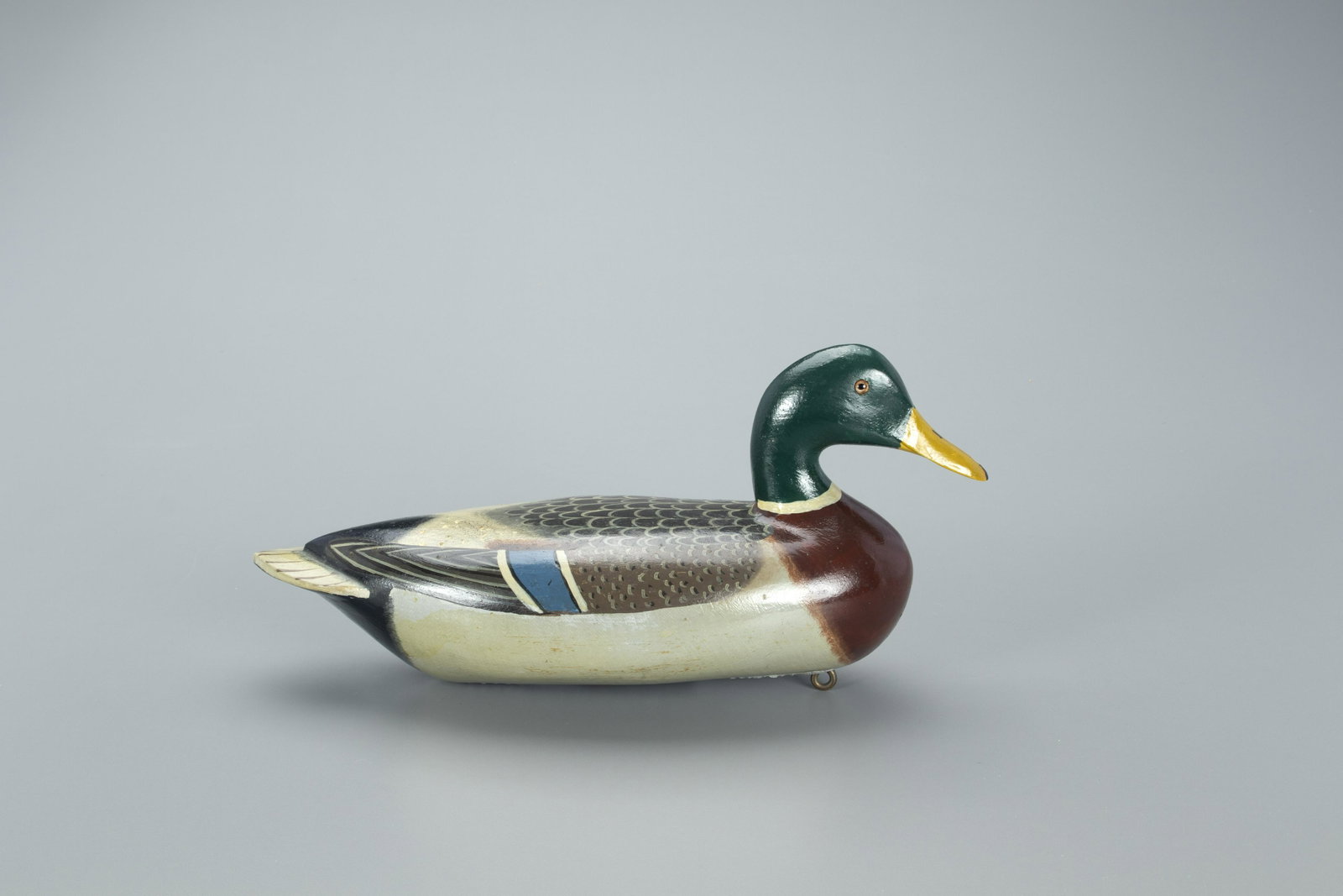 Mallard Drake Decoy, Charles H. Perdew (1874-1963): Mallard Drake Charles H. Perdew (1874-1963) Henry, IL, c. 1950 16 in. long In addition to making decoys and innovative bird calls, Perdew was a market gunner, a trapper, and a carpenter who helped bui