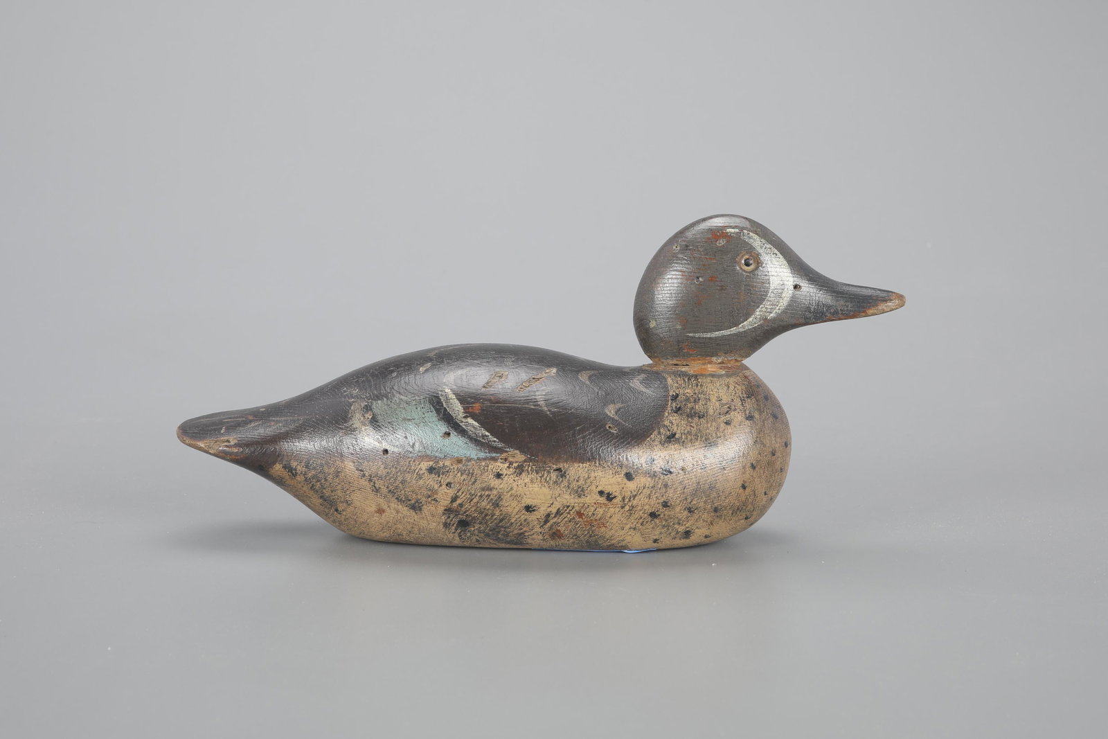Blue-Winged Teal Decoy by Mason Decoy Factory (1896-1924): Blue-Winged Teal Mason Decoy Factory (1896-1924) Detroit, MI, c. 1910 12 in. long A standard-grade decoy believed to be from the Princeton Gun Club with a stylized "SW" brand on the underside. Origina