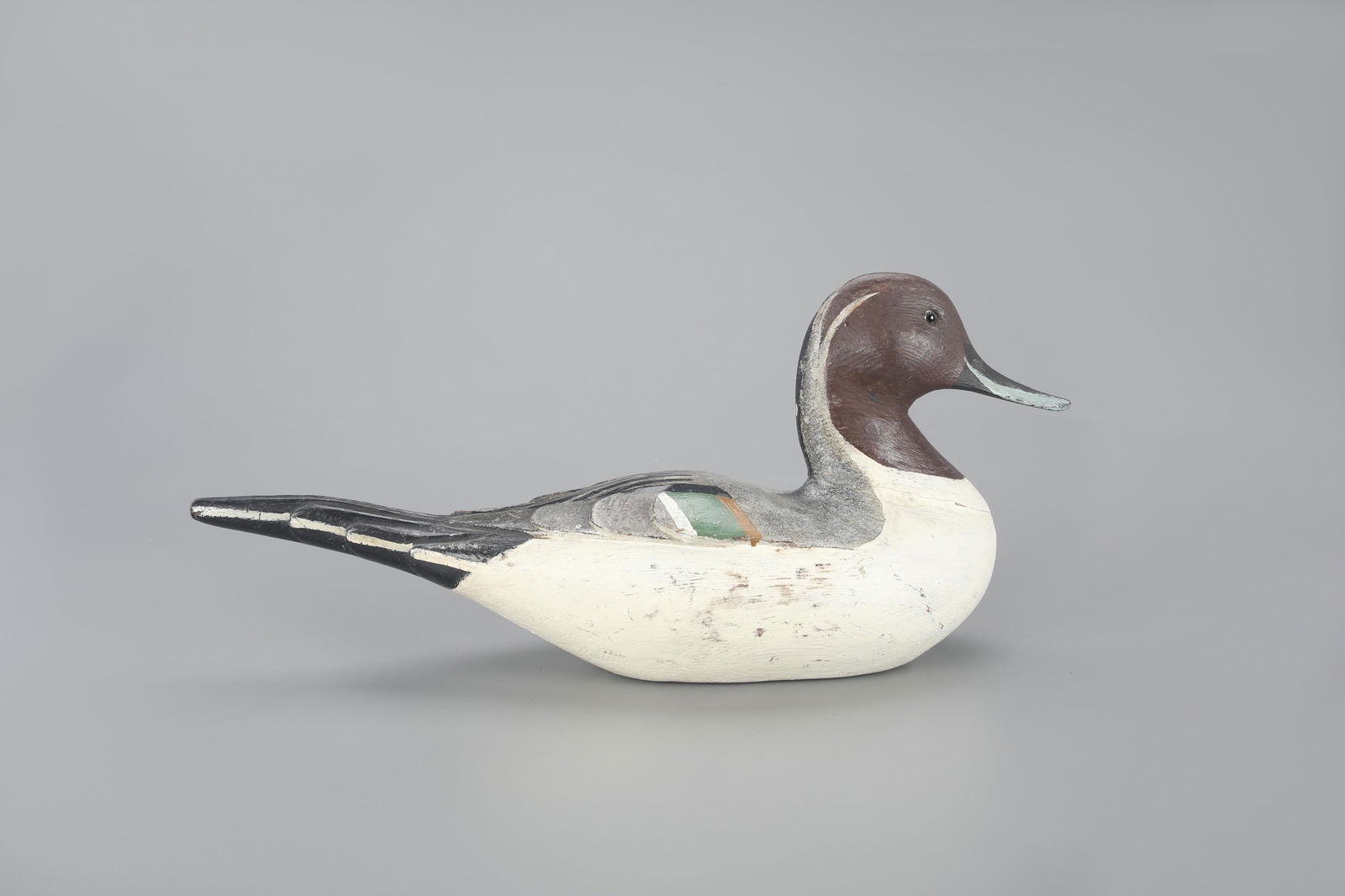 Los Banos Pintail Drake Decoy: Los Banos Pintail Drake Los Banos, CA, c. 1925 17 1/2 in. long This decoy hails from an elite group by a highly celebrated, yet unknown maker. They have been referred to as the "Los Banos Unknowns" no