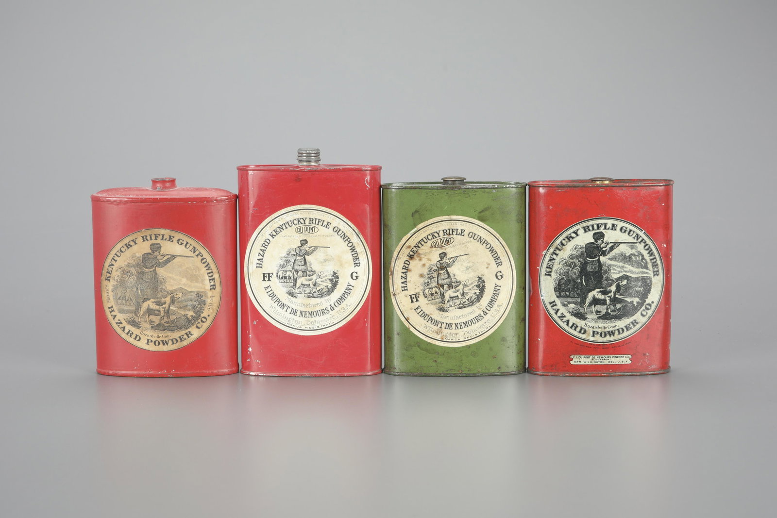 Four Hazard Powder Tins: Four Hazard Powder Tins largest 6 1/2 in. tall Four Hazard Kentucky Rifle Gunpowder tins. As found. Provenance: Private Collection, a descendant of Thomas Coleman du Pont