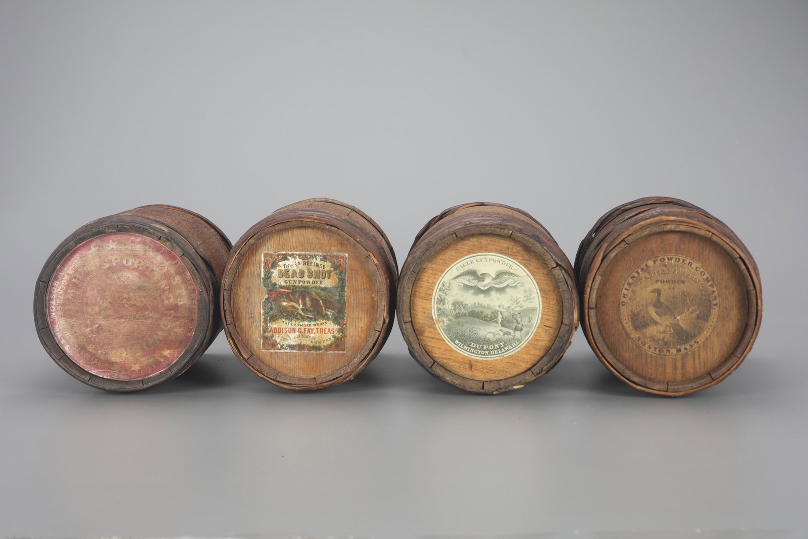 Four Powder Kegs: Four Powder Kegs largest is 9 in. tall One Du Pont Eagle Gunpowder Keg (label is a reproduction), one Hazard Kentucky Rifle Gunpowder Keg, one Triple-Refined Deadshot Gunpowder Keg, one Oriental Powde