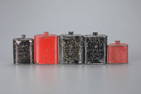 Five Powder Tins