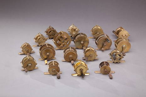 Brass Fishing Reels: Brass Fishing Reels This lot contains eighteen assorted brass fishing reels, including one stamped "Made in Germany," and two made by Hendryx, one of which bears a patent date of 1876. Provenance: