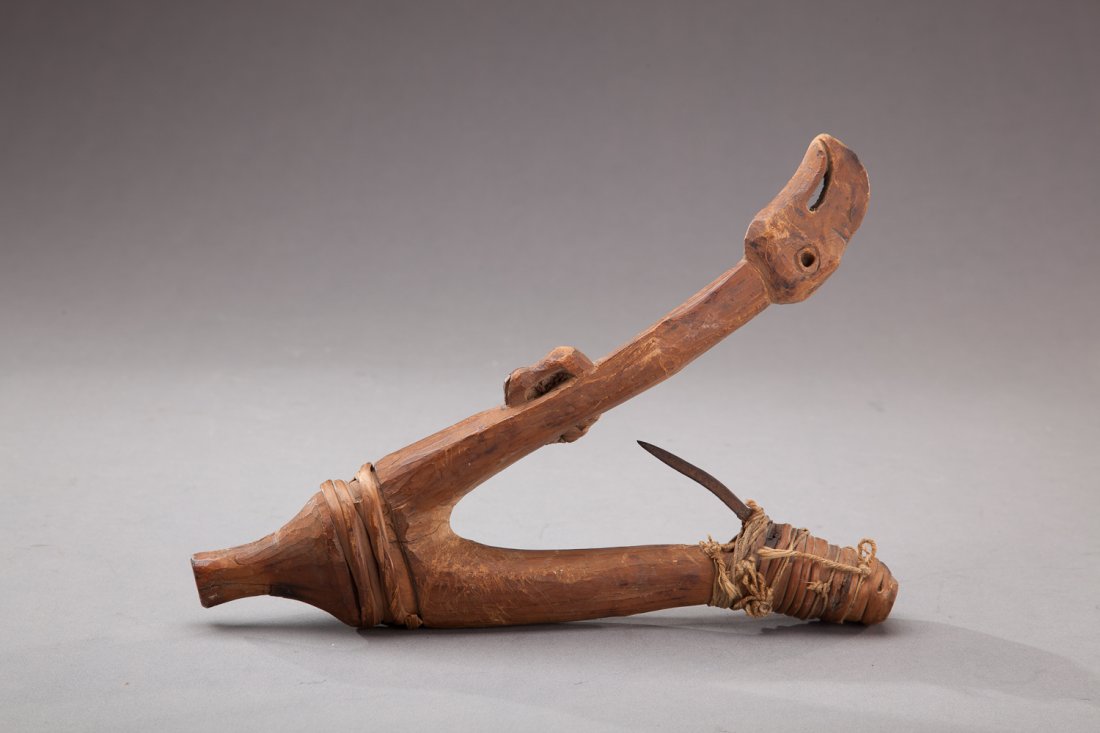 Halibut Hook: Halibut Hook Native American Pacific Northwest Coast A halibut fish hook measuring ten-and-one-half inches long that exhibits a carved bird motif and a square iron spike. Provenance: William Tosi Coll