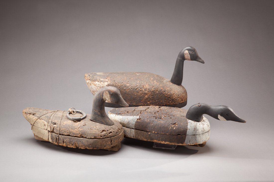 Three Canada Geese: Three Canada Geese Long Island, NY A cork-bodied goose decoy attributed to Lewis Howell (1895-1961) of Center Moriches, NY, c. 1930. The decoy's keel bears two rig brands, "W.S. Dana" and "N. C. Mille