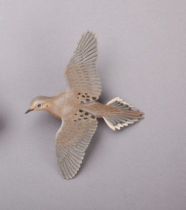 Miniature Flying Dove: Miniature Flying Dove Eddie Wozny (b. 1959) Cambridge, MD, 2012 With a wingspan of five-and-one-quarter inches, this carving is signed by the maker on the bottom and retains his incised “W.”