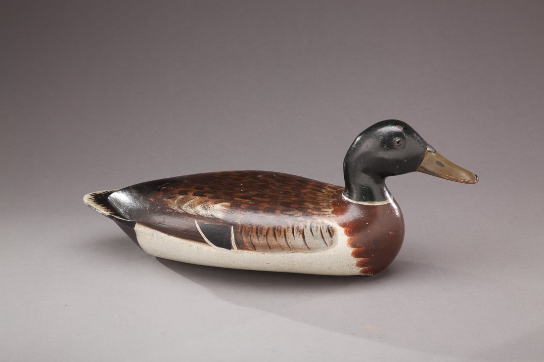 Mallard Drake: Mallard Drake Bert Graves (1887-1956) Peoria, IL, c. 1930 A superb "white sided" decoy by this maker with comb paint, fine feather detail and original "G. B. Graves. Decoy Co. Peoria, Ill." weight and
