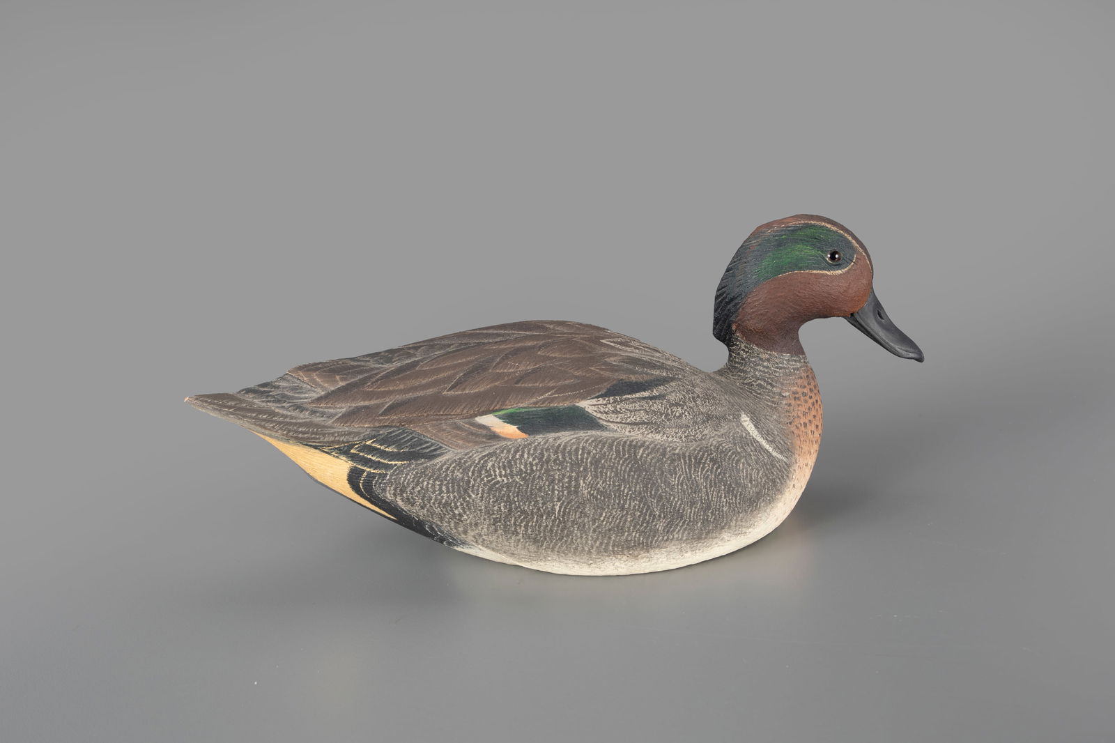 Green-Winged Teal Drake Decoy by Roger Barton: Green-Winged Teal Drake Roger Barton San Francisco, CA, 1972 12 in. long Signed and dated on the bottom. Original paint with light wear, including paint chip to tail. Provenance: Estate of Martin F. "
