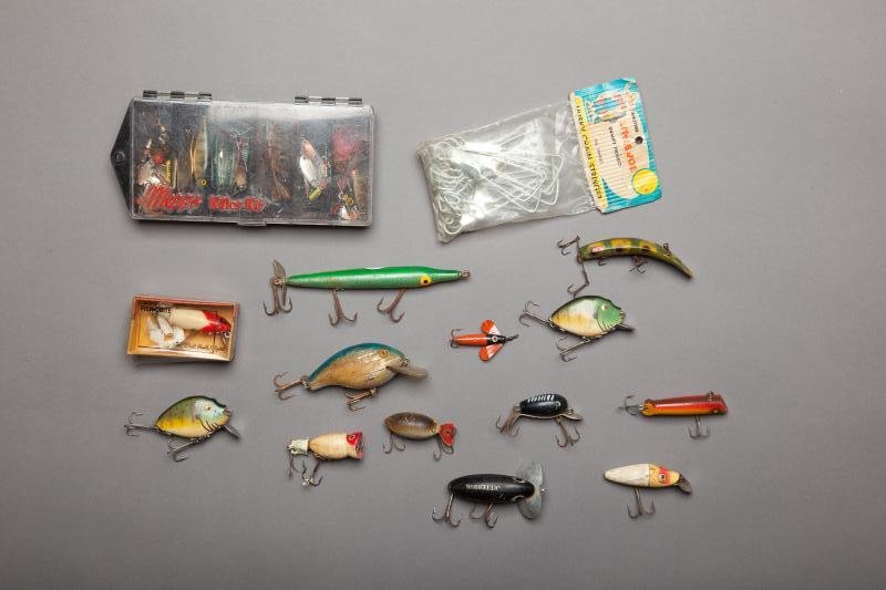 Box of Lures: Box of Lures As found. Two dozen fishing lures and some fishing collector's ephemera. Malcolm Burnham Rowe Collection