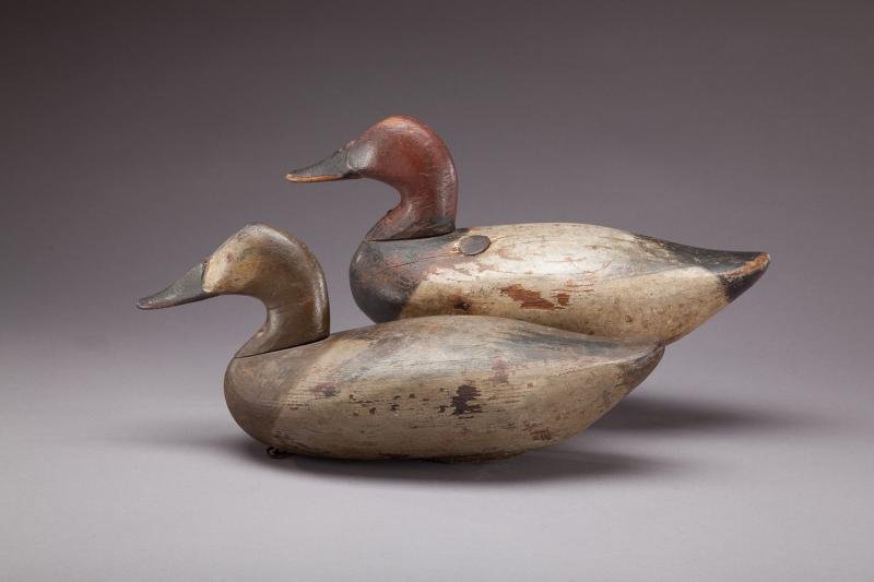 Canvasback Pair: Canvasback Pair Jim Currier (1886-1969) Havre de Grace, MD, c. 1920 The decoys have their original rigging and the drake has an "F" owner's brand on the bottom. Original paint with heavy gunning wear 
