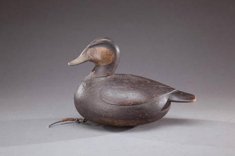 Ruddy Duck: Ruddy Duck Mark S. McNair (b. 1950) Craddockville, VA, c. 1990 The decoy exhibits a gently round-shaped body with lightly raised wings and a pronounced head with attitude. Signed "McNair" on the under