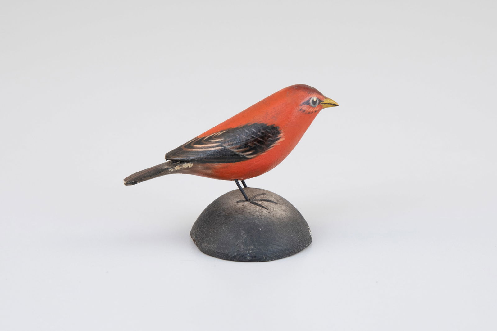 Miniature Scarlet Tanager by A. Elmer Crowell (1862-1952): Miniature Scarlet Tanager A. Elmer Crowell (1862-1952) East Harwich, MA, c. 1920 2 1/2 in. long Signed with the "Maker" ink stamp. Original paint with light wear. Provenance: From a Chatham, Massachus