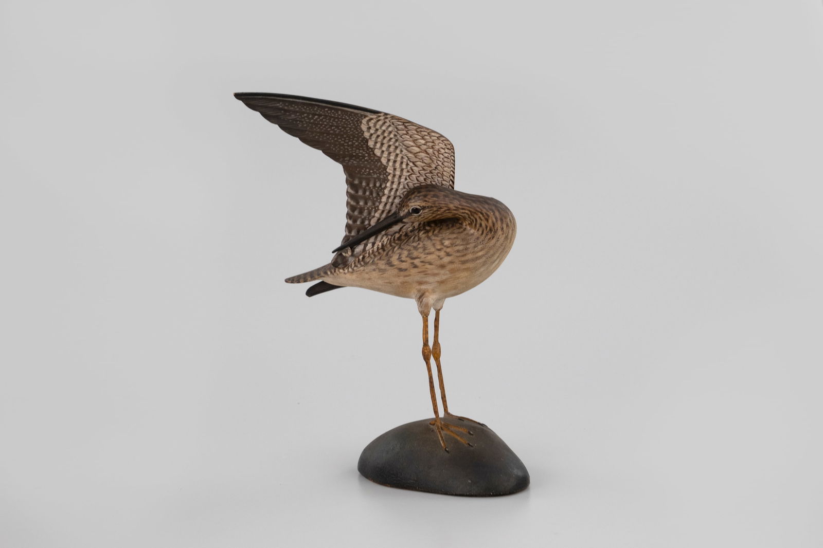 The Underwood Wing-Up Greater Yellowlegs by A. Elmer Crowell (1862-1952): The Underwood Wing-Up Greater Yellowlegs A. Elmer Crowell (1862-1952) East Harwich, MA, c. 1930 12 in. tall The preening posture presents an exceptionally difficult challenge for any maker. Crowell wa