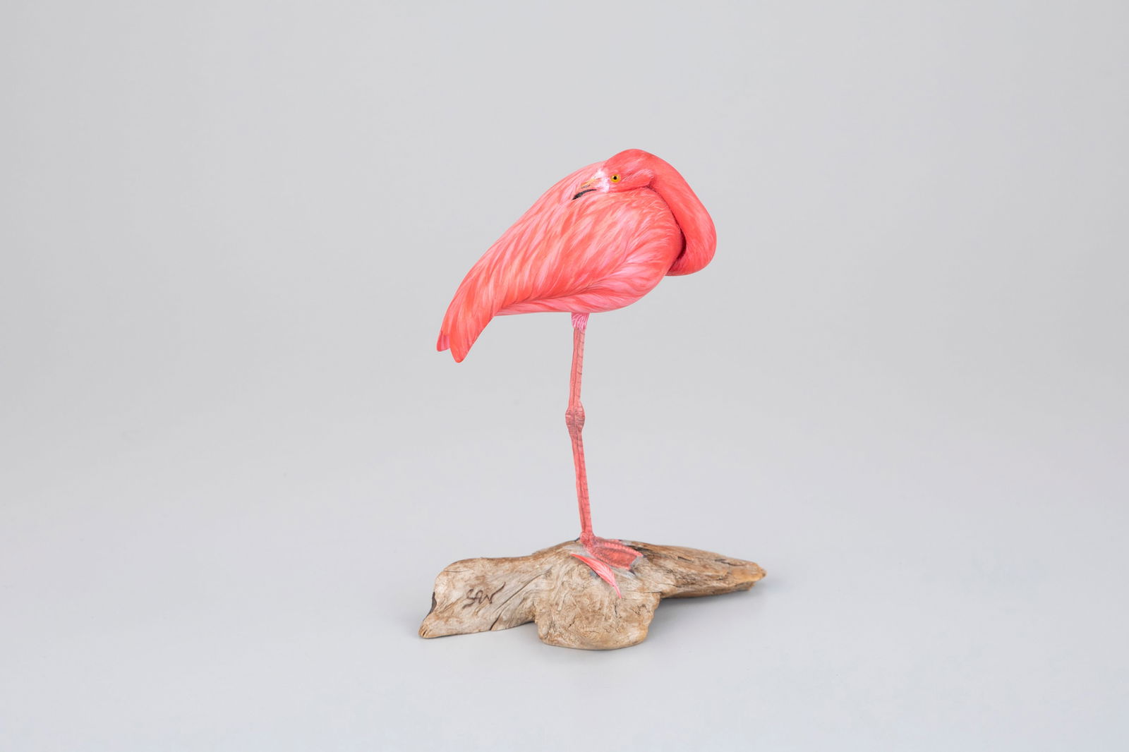 Miniature Sleeping Flamingo by Steve Weaver (b. 1950): Miniature Sleeping Flamingo Steve Weaver (b. 1950) Sandwich, MA, 2007 8 in. tall A rare carving, signed and dated by the artist on the underside of its base. The top of base bears the maker's