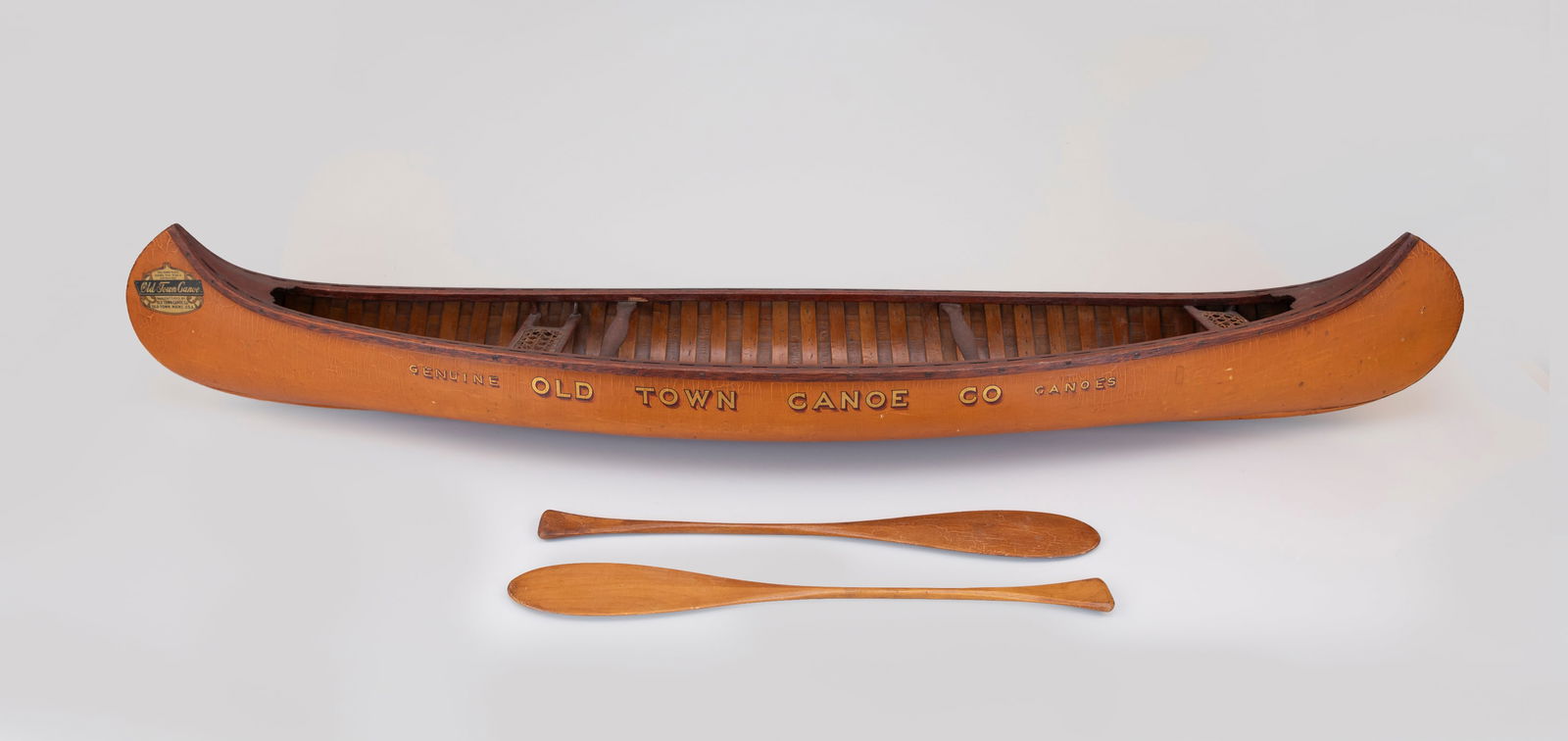 Old Town Salesman Sample Canoe with Two Paddles by Old Town Canoe Company (1903-present): Old Town Salesman Sample Canoe with Two Paddles Old Town Canoe Company (1903-present) Old Town, ME c. 1915 51 in. long The Old Town Canoe Company of Old Town, Maine, is a historic maker of canvas-cove