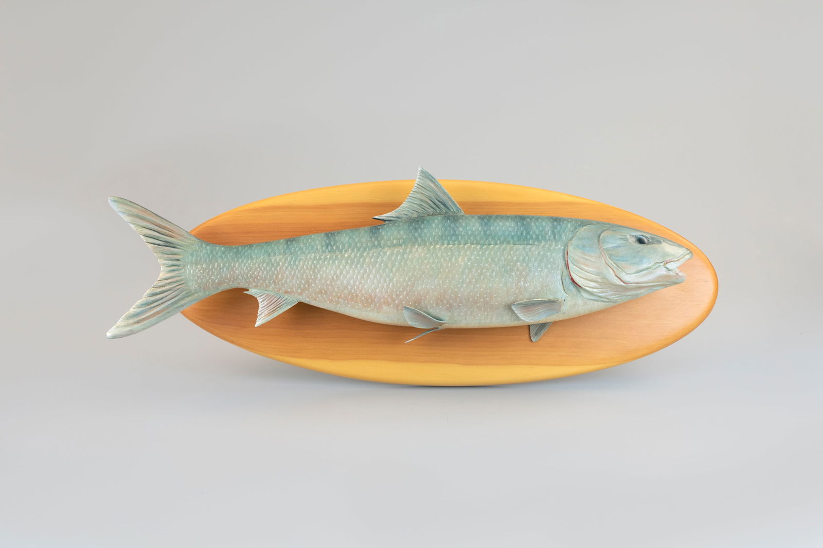 Bonefish Carving by Mike Borrett (b. 1960): Bonefish Carving Mike Borrett (b. 1960) Madison, WI plaque is 24 in. long An exceedingly rare warm water species for Borrett. Signed by the maker on the back. Original paint with light wear.