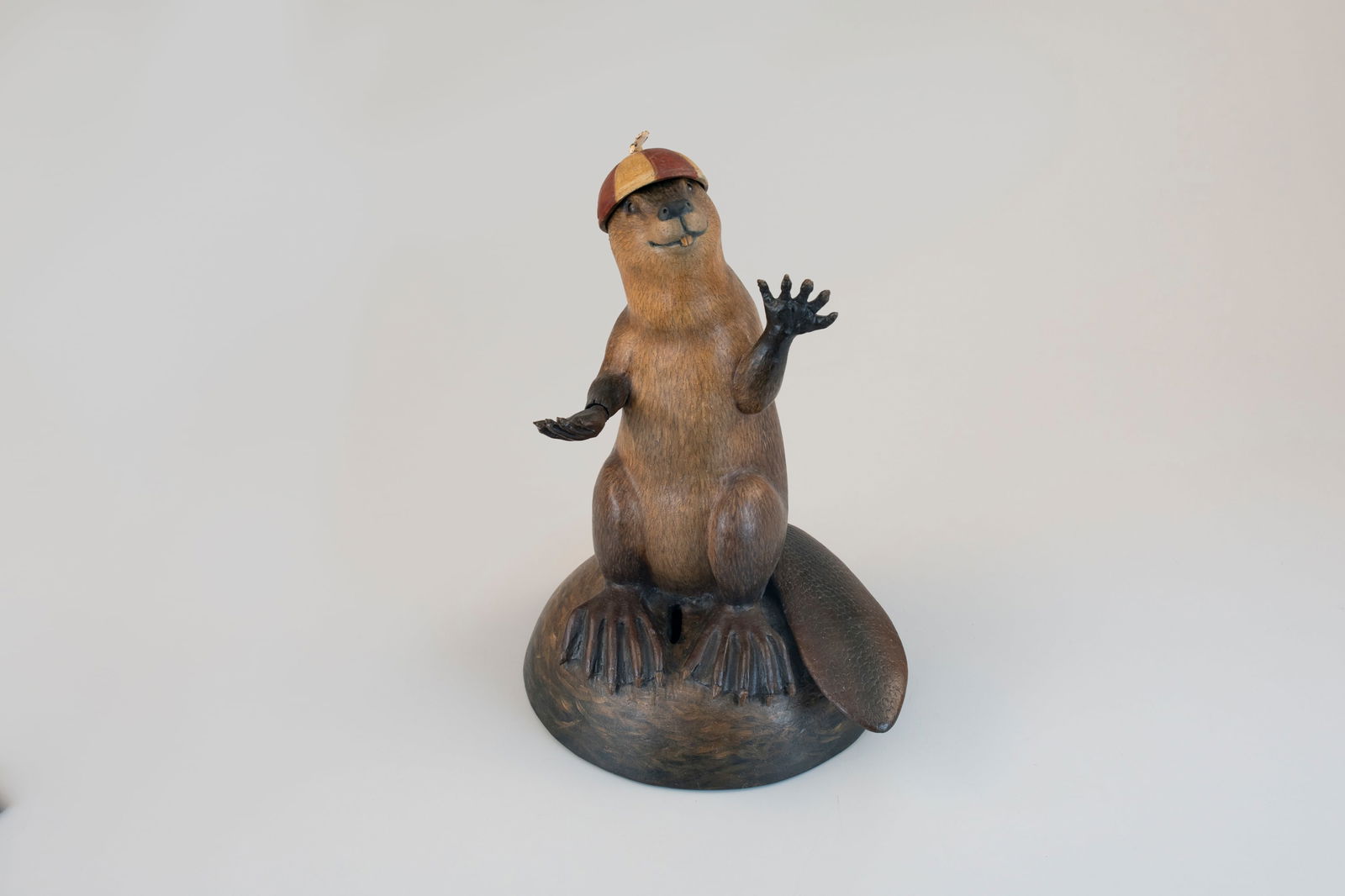 Beaver Mechanical Bank Game by Frank Finney (b. 1947): Beaver Mechanical Bank Game Frank Finney (b. 1947) Capeville, VA 14 in. tall, 10 1/2 in. wide This unique Finney carving shows the artist at the height of his creative and engineering prowess. A coin