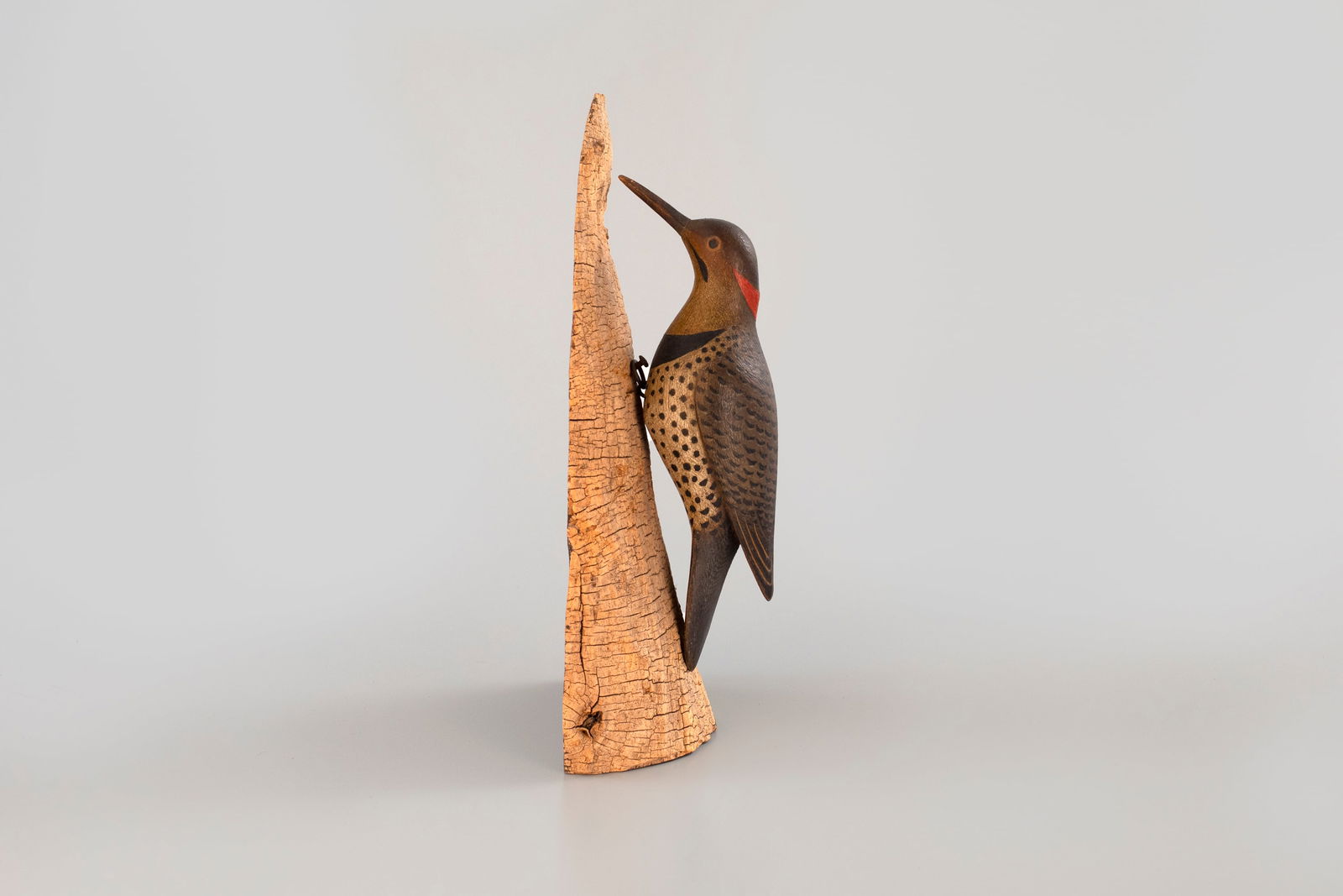 Flicker by Mark McNair (b. 1950): Flicker Mark McNair (b. 1950) Craddockville, VA, c. 2000 11 in. long Flicker decoys of any vintage are rare, with only a handful of early examples originating from the Crisfield, Maryland, area.