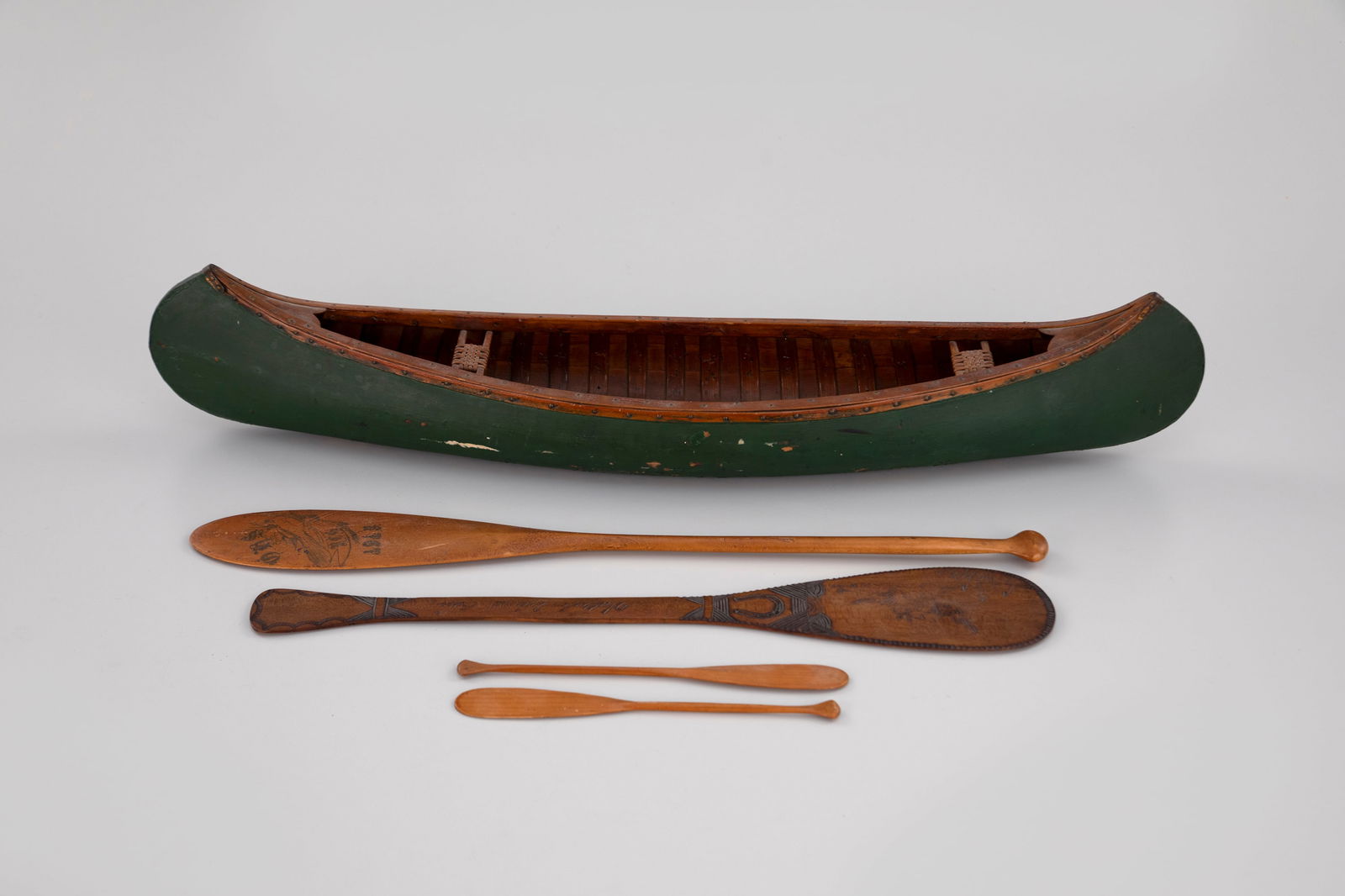Salesman Sample Canoe by Robert Glidden (born c. 1899): Salesman Sample Canoe Robert Glidden (born c. 1899) Bangor, ME, c. 1920 28 in. long According to the consignor, this twenty-eight-inch model canoe was made by Robert Glidden of Bangor, Maine. Robert a
