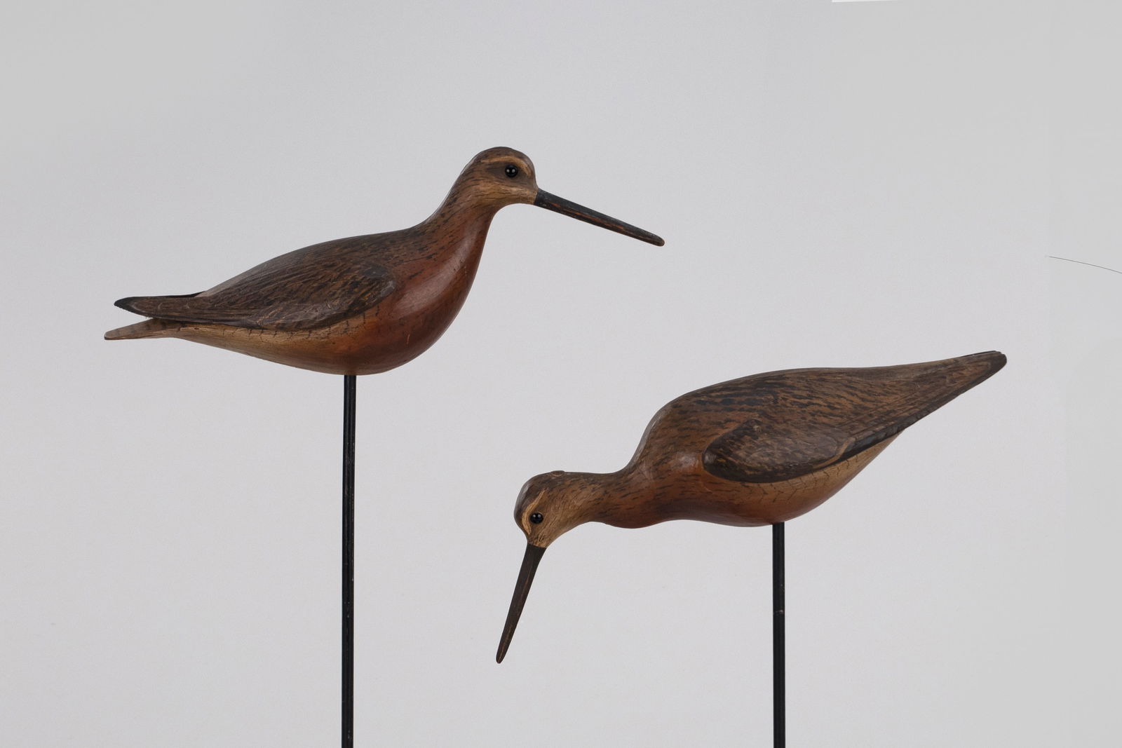 Dowitcher Pair by William Gibian (b. 1946): Dowitcher Pair William Gibian (b. 1946) Onancock, VA 13 in. long This pair of carvings is signed by the maker with an incised "GIBIAN" on the undersides. Provenance: Estate of Marilyn M. Herlin