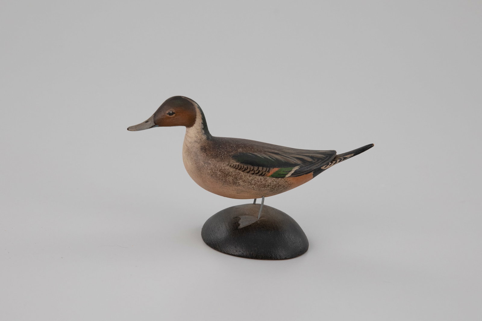 Miniature Pintail Drake by A. Elmer Crowell (1862-1952): Miniature Pintail Drake A. Elmer Crowell (1862-1952) East Harwich, MA, c. 1935 3 in. tall Signed by the maker on the bottom of the base with his rectangular stamp. Original paint with light wear.