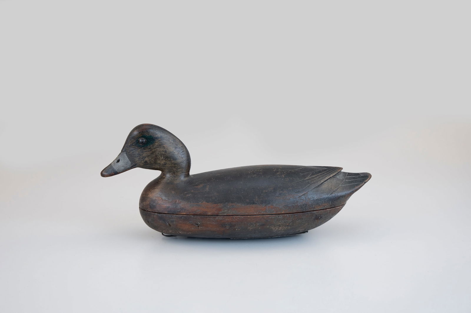 Wigeon Drake by John English (1848-1915): Wigeon Drake John English (1848-1915) Florence, NJ, c. 1880 14 in. long An English decoy showcasing the maker's best form with exceptional wing tip and tail refinements. This hollow carved Delaware Ri