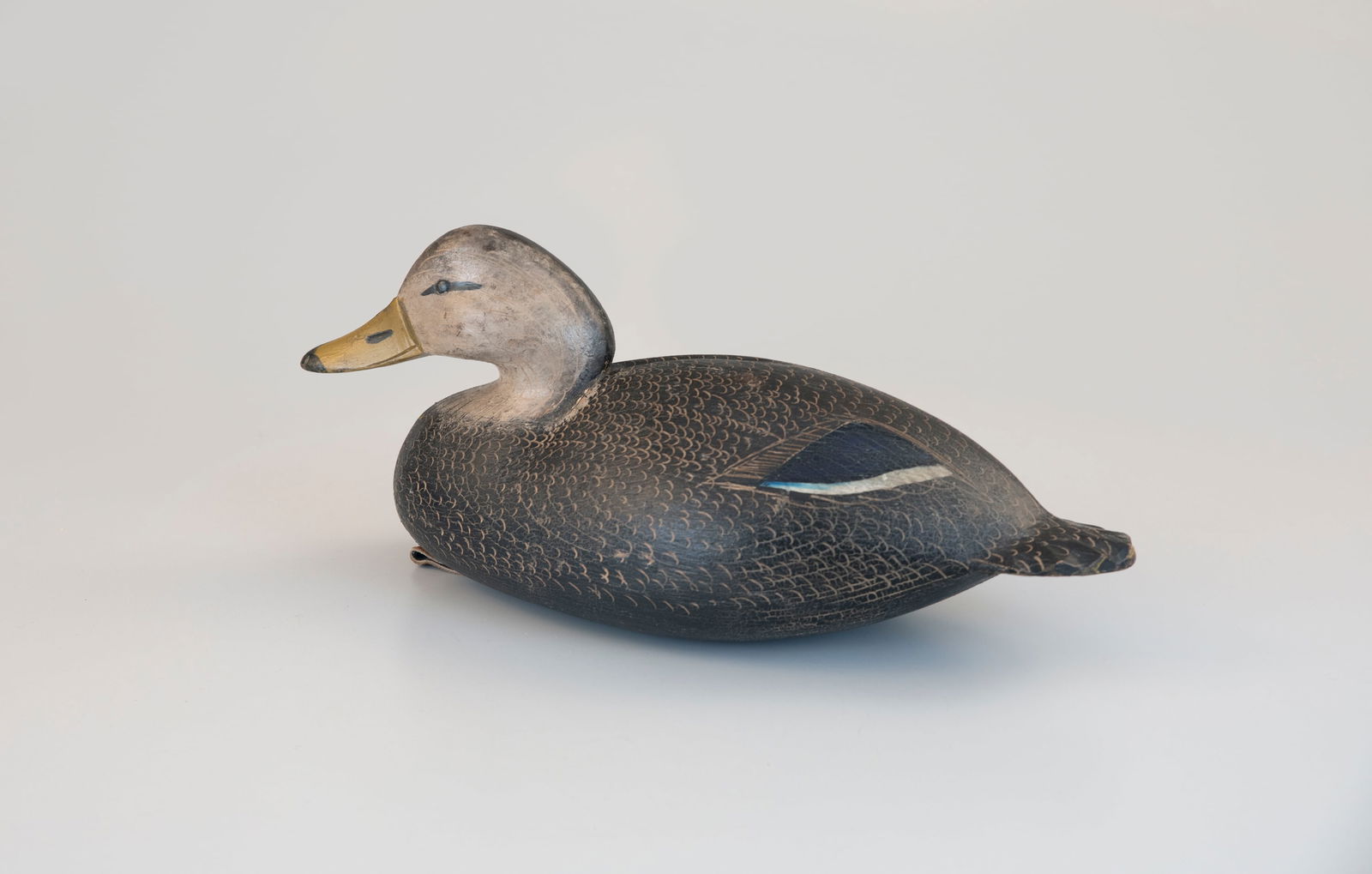 Bickel-Rig Turning Black Duck by Ira D. Hudson (1873-1949): Bickel-Rig Turning Black Duck Ira D. Hudson (1873-1949) Chincoteague, VA, c. 1945 16 in. long This special-order decoy is one of the three iconic Bickel rig black ducks. Two of which, including this b