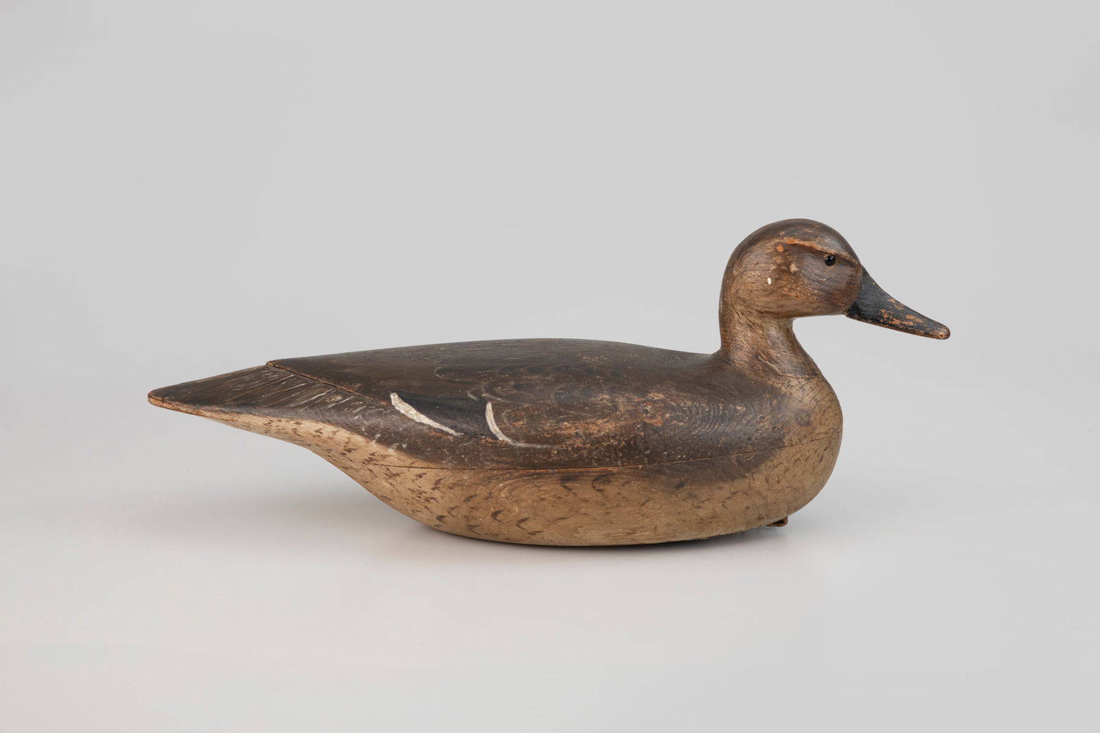 Purnell Watson Pintail Hen by Dave "Umbrella" Watson (1851-1938): Purnell Watson Pintail Hen Dave "Umbrella" Watson (1851-1938) Chincoteague, VA, c. 1925 17 1/2 in. long "A couple of interesting and well-informed guides led the way to the former home of Dave Watson,