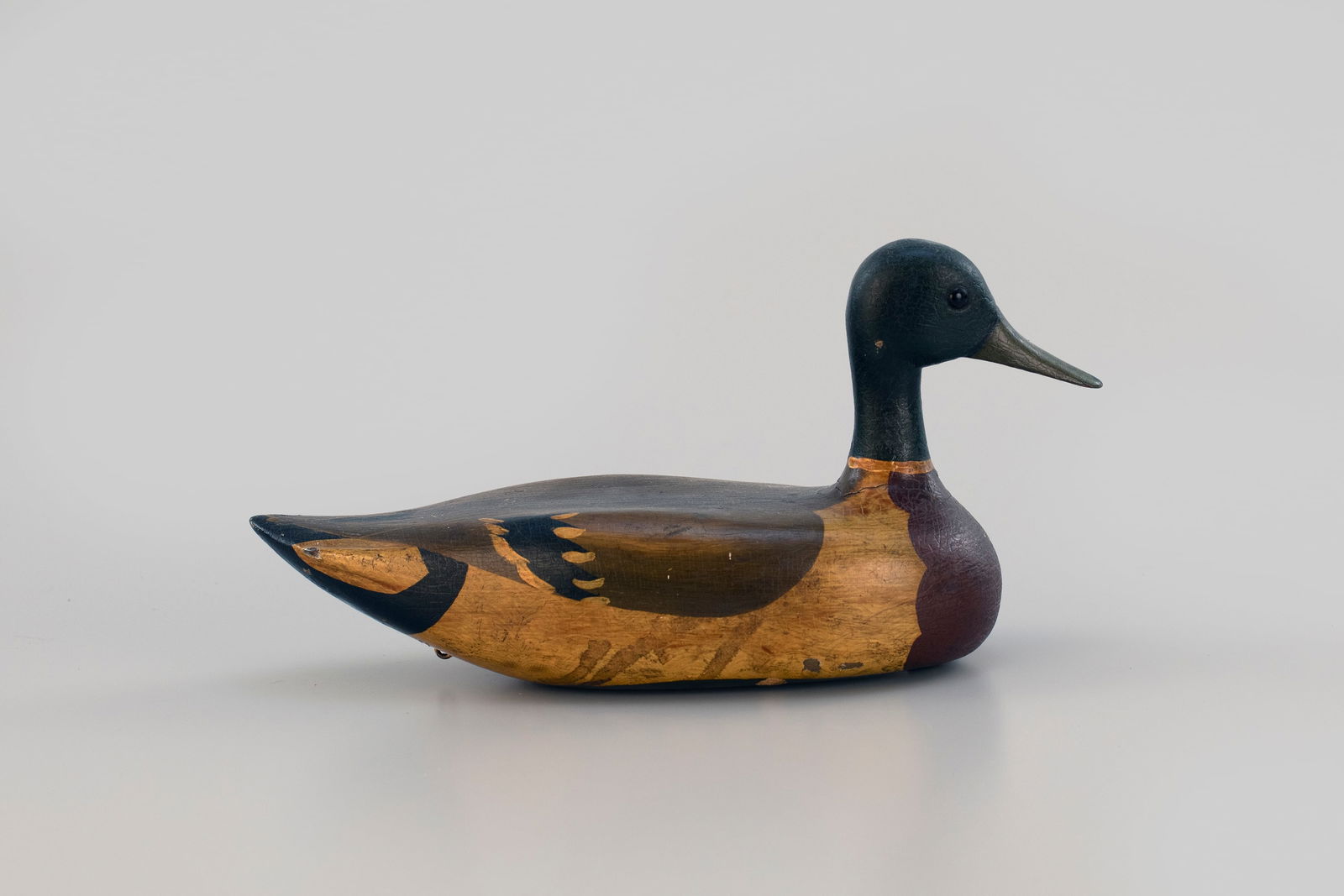 Rare Mallard by Oscar Alford (1883-1962): Rare Mallard Oscar Alford (1883-1962) Beardstown, IL, c. 1920 13 1/2 in. long Along with Otto Garren (1890-1968), Oscar Alford had perhaps the most whimsical style of all the Illinois River decoy make