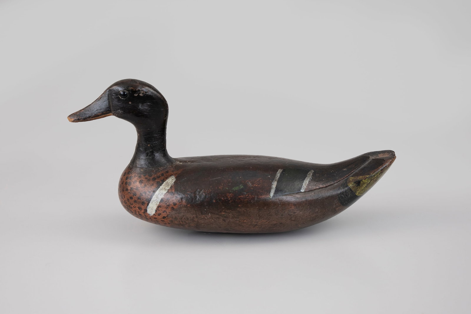 Green-Winged Teal by Oscar Murphy (1850-1919): Green-Winged Teal Oscar Murphy (1850-1919) New Orleans, Louisiana, c. 1900 12 in. long The rig of these teal was found by Jack White. Brian Cheramie describes a related "special green-winged teal" in