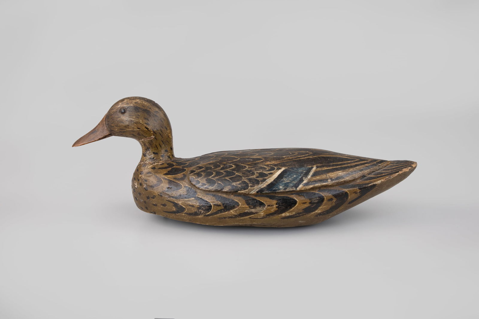 Mallard Hen by Mitchel LaFrance (1882-1979): Mallard Hen Mitchel LaFrance (1882-1979) Phoenix-Davant, LA 15 1/2 in. long A classic LaFrance with strong and bright feathering, full cheeks, raised wing carving, and its original rigging. Original p