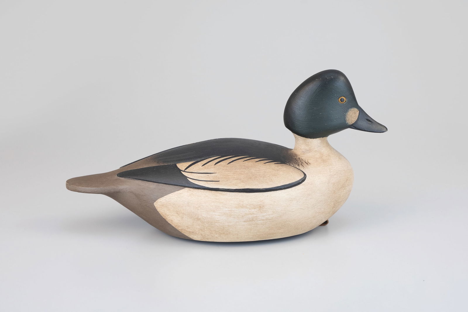 Goldeneye by Marty Collins (b. 1960): Goldeneye Marty Collins (b. 1960) East Wareham, MA, 2020 15 1/4 in. long Dated, branded, and signed "M. D. Collins" on the bottom. Original paint with light wear. Provenance: Mike Caton Collection
