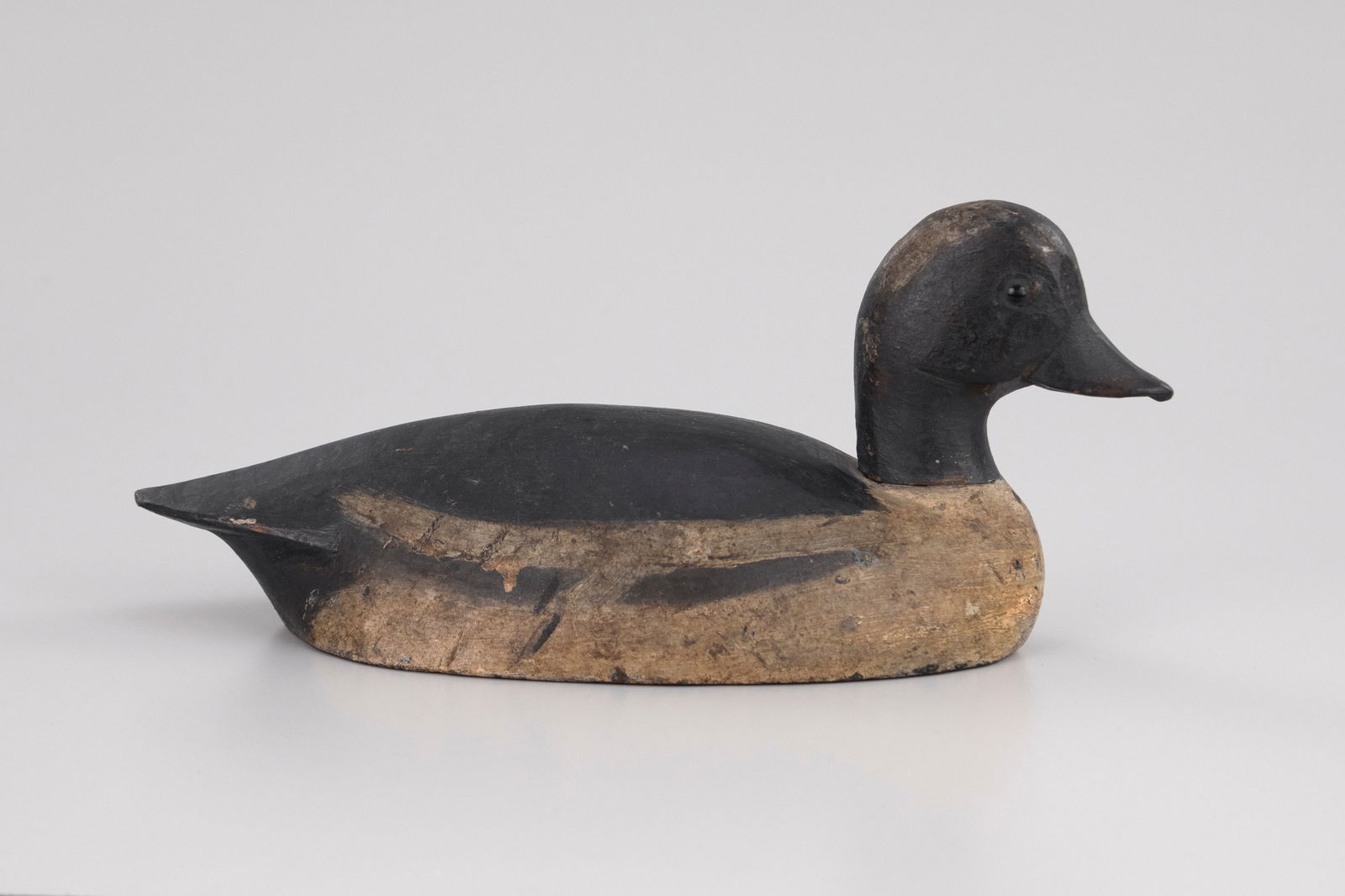 Bufflehead: Bufflehead Ontario, Canada, c. 1900 13 in. long Old, possibly original, paint with moderate gunning wear. Provenance: Jeff and Joyce Hay Collection