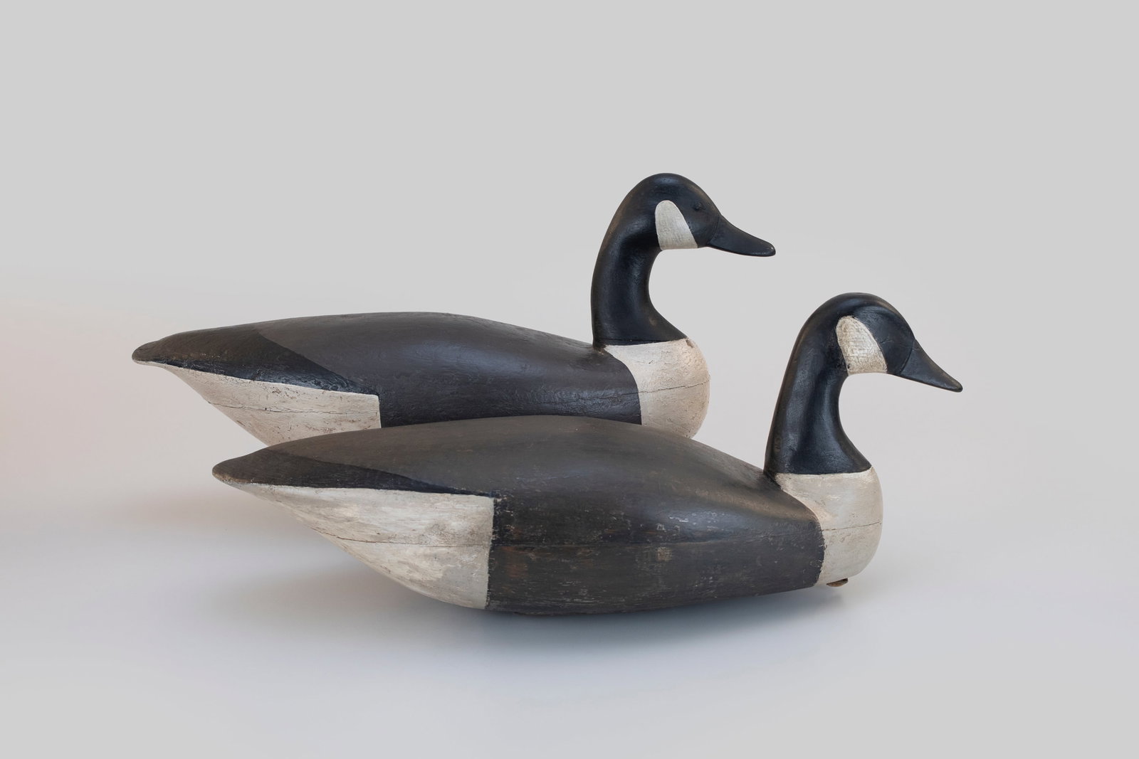 Two Hollow Goose Decoys: Two Hollow Goose Decoys New Jersey 23 in. long One goose from the late 19th century is marked for Tom Applegate of Tom's River, NJ and the other is marked for Henry Kilpatrick (1867-1945) of Barnegat,