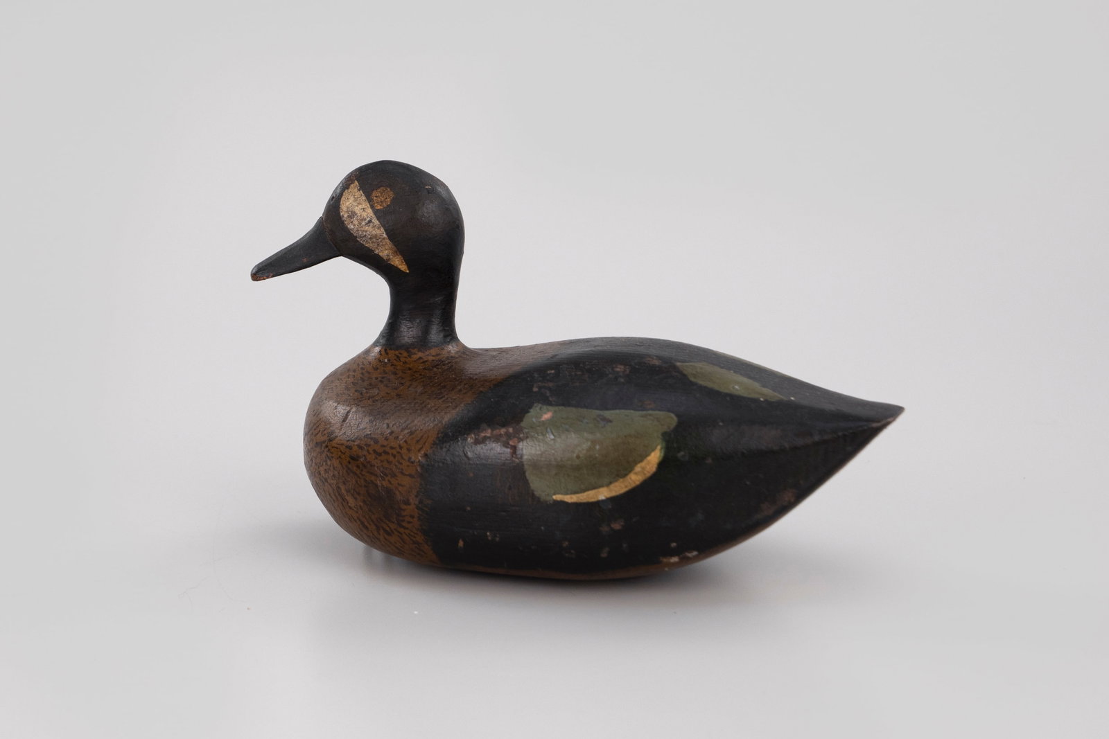 Blue-Winged Teal: Blue-Winged Teal Midwest, c. 1920 9 in. long A Mid-west teal with double blue plumage and gold eyes. Original paint with even gunning wear and restored neck. Provenance: Jeff and Joyce Hay