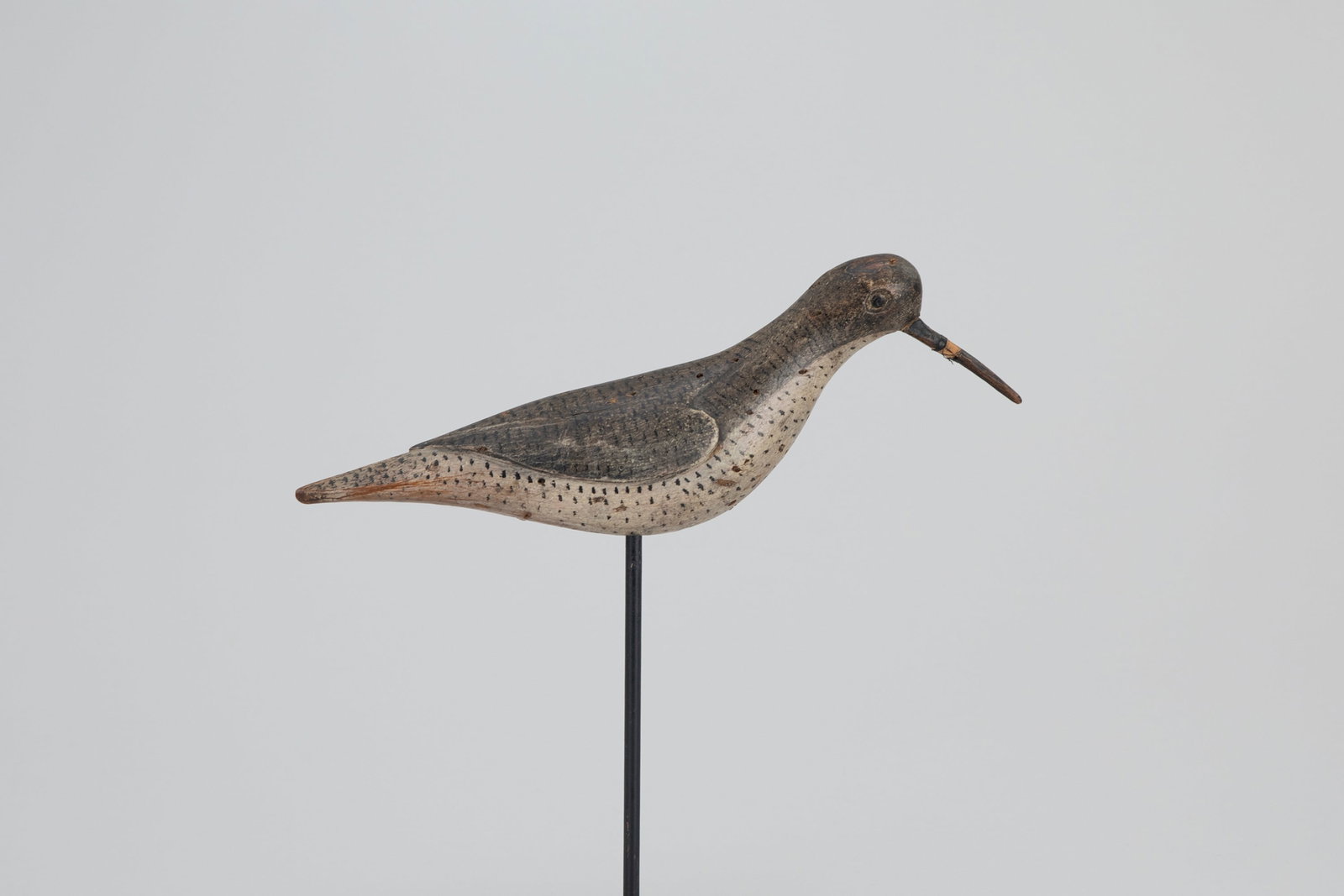 Running Yellowlegs by William H. Southard (1874-1940): Running Yellowlegs William H. Southard (1874-1940) Seaford, Long Island, NY, c. 1900 11 1/4 in. long This racy bird from Seaford has S-curve wings and nice stippled paint. Original paint with even gun