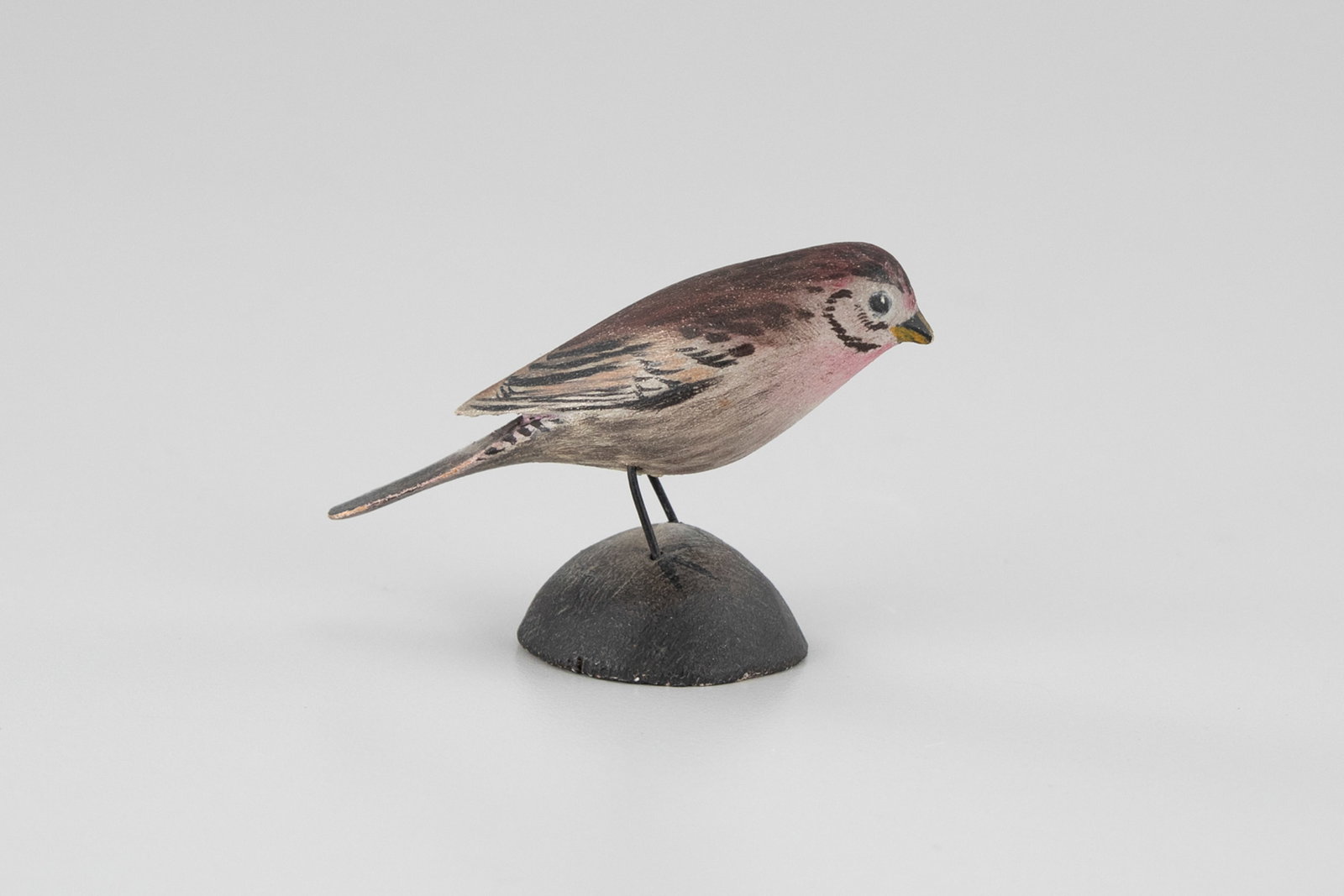 Early Miniature Purple Finch by A. Elmer Crowell (1862-1952): Early Miniature Purple Finch A. Elmer Crowell (1862-1952) East Harwich, MA, c. 1923 2 3/4 in. long Lots 362 through 373 are from a single set that has remained in the family since they were acquired f
