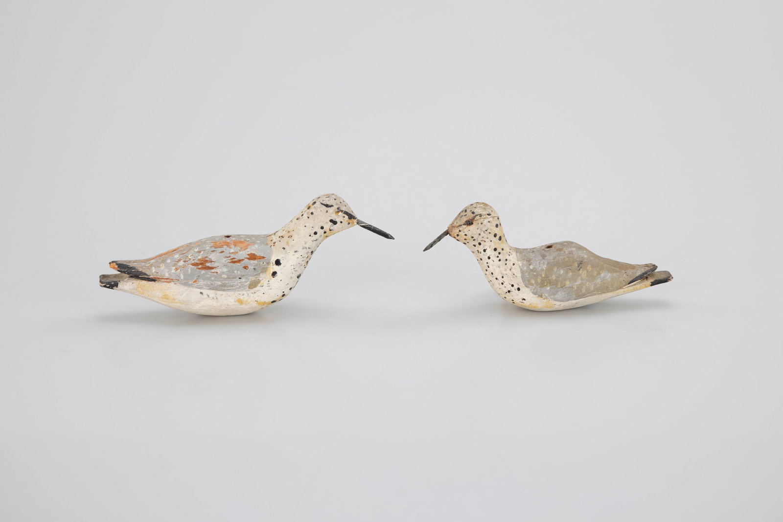 Sanderling Pair: Sanderling Pair New Jersey, c. 1920 6 in. long A small pair of New Jersey beach birds with wire bills and split wing tips. As found with old paint by the maker. Provenance: Richard and Lynn Gove