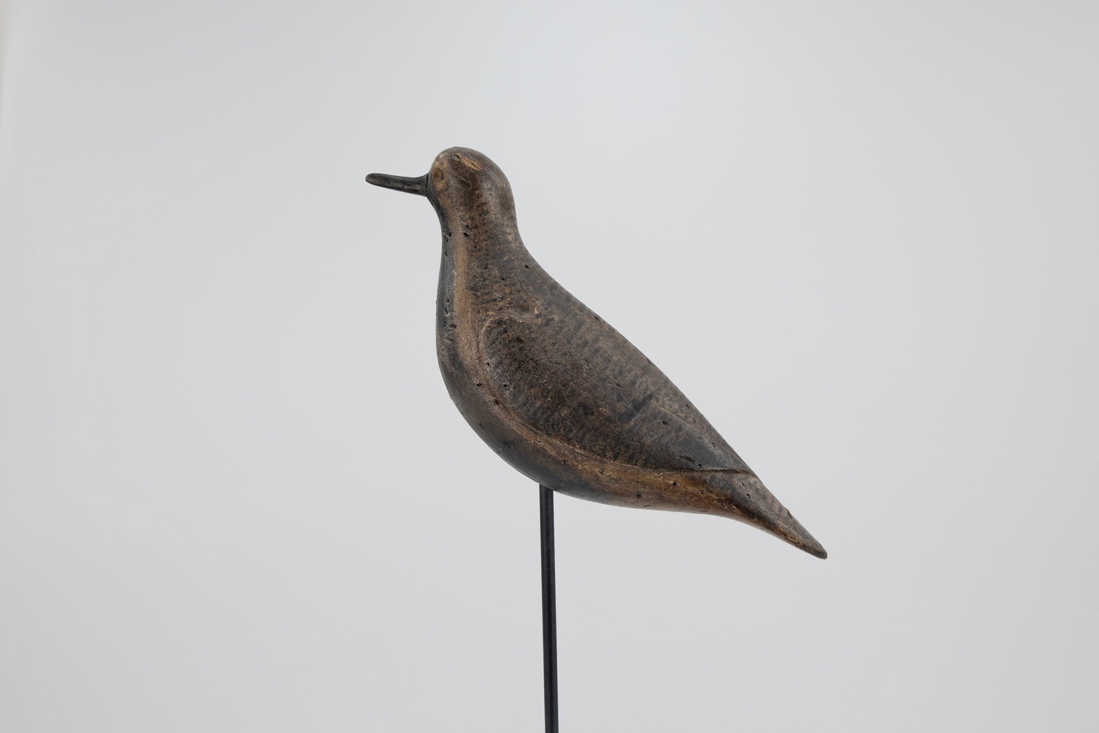 Black-Bellied Plover by Obediah Verity (1813-1901): Black-Bellied Plover Obediah Verity (1813-1901) Seaford, Long Island, NY, c. 1880 11 in. long A beetle-headed form with an incised "X" under the tail. An old Seaford gunning warrior with good form.