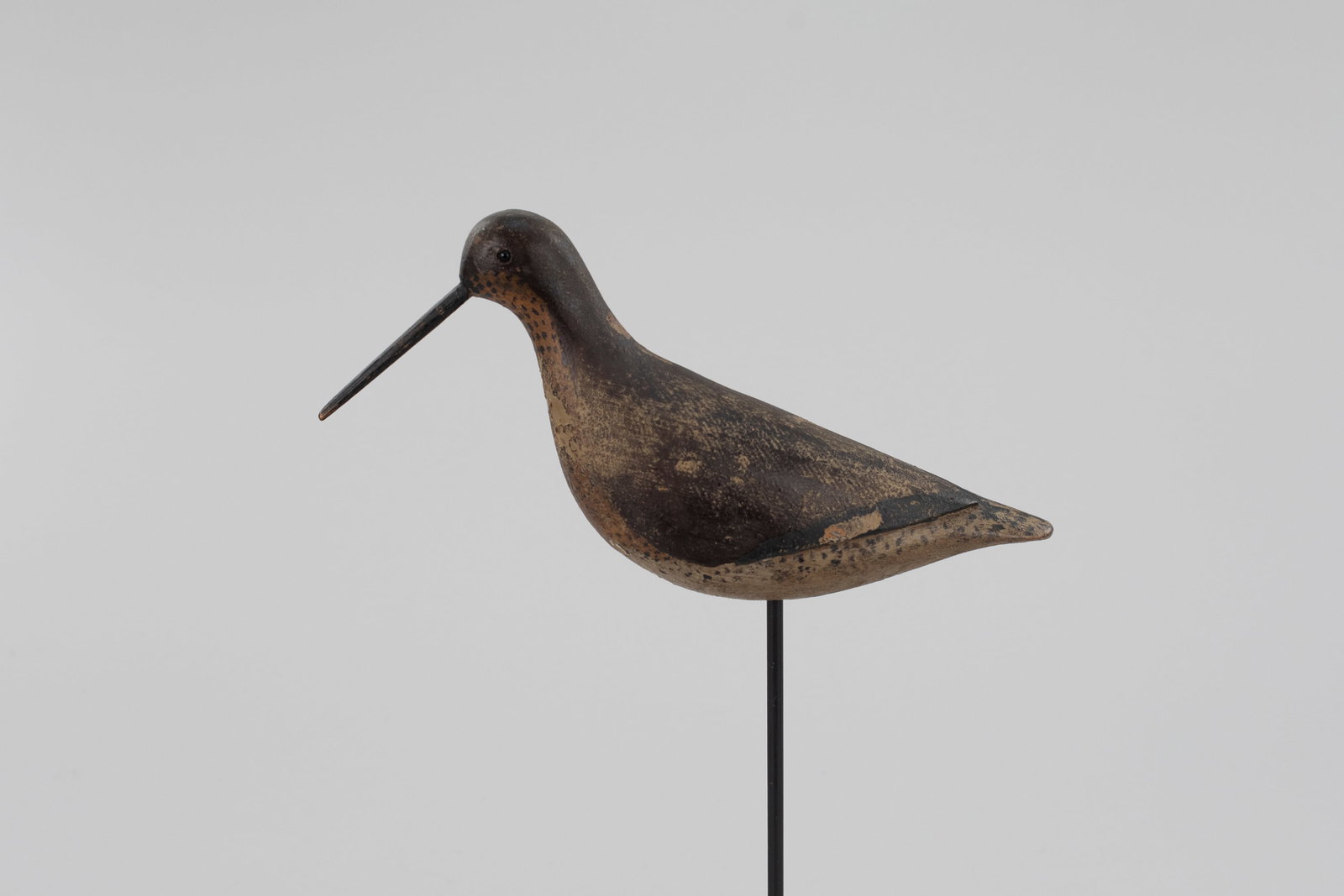Long-Billed Dowitcher by Thomas Gelston (1851-1924): Long-Billed Dowitcher Thomas Gelston (1851-1924) Quogue, Long Island, NY, c. 1880 11 1/2 in. long A full-bodied shorebird decoy with a reddish back and breast in breeding plumage. Original paint with