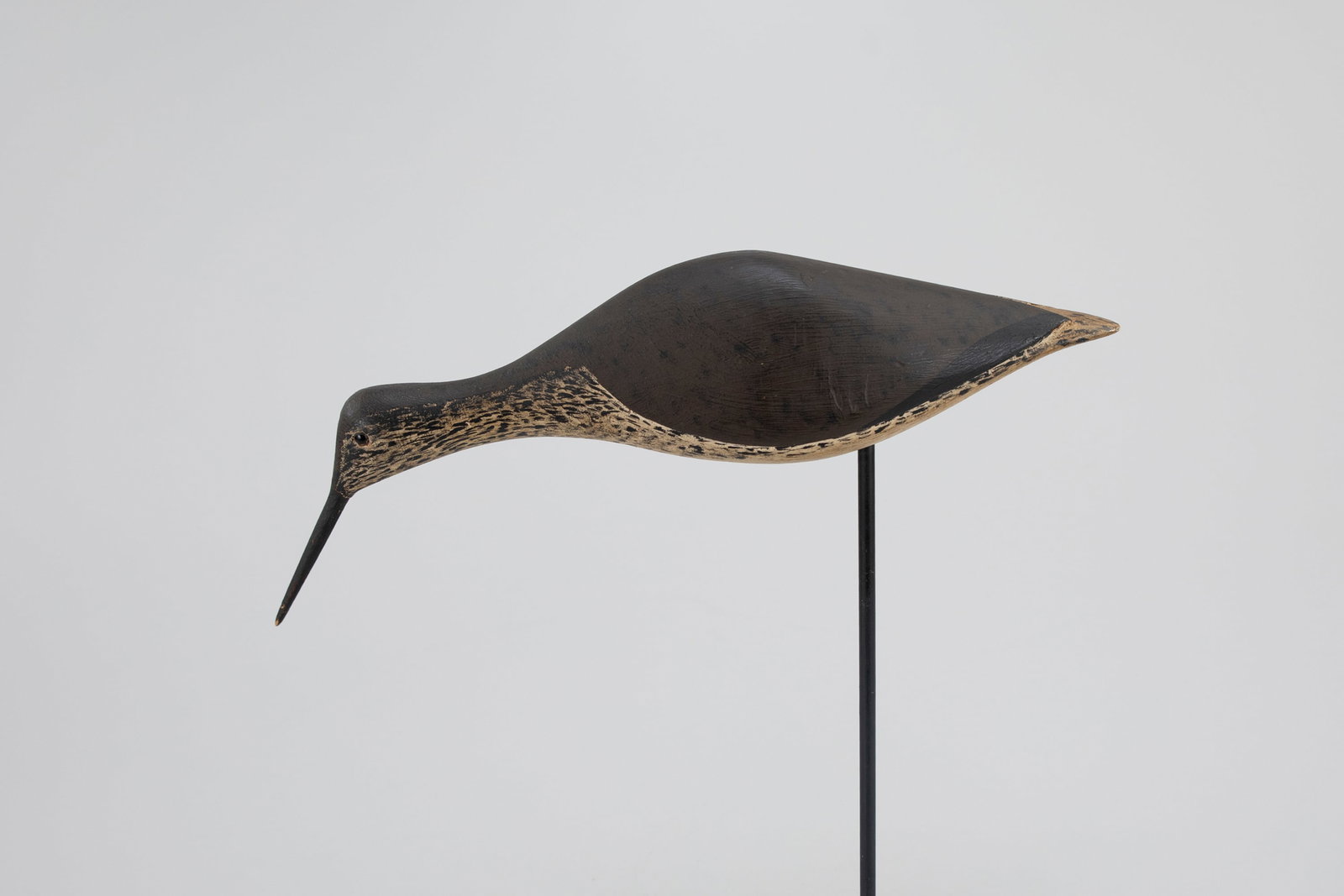 Feeding Yellowlegs by Thomas Gelston (1851-1924): Feeding Yellowlegs Thomas Gelston (1851-1924) Quogue, Long Island, NY, c. 1890 14 in. long An iconic Long Island form, a related Gelston running pattern was chosen by the Long Island Decoy Collectors 